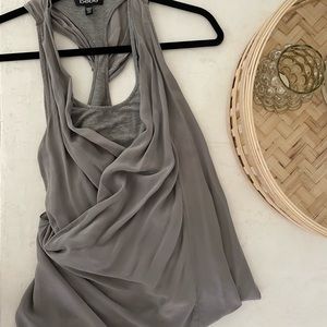 Grey racerback tank with silk overlay